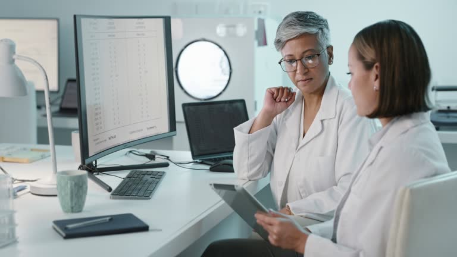 Clinical Data Management professionals analyzing early-phase clinical trial data