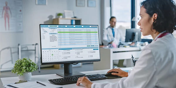 Pharmacovigilance representative analyzing drug safety data in a corporate office in Bangalore